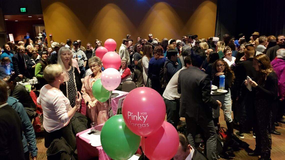 Whatcom County Democrats gather at Mount Baker Theatre to await election results Tuesday night.