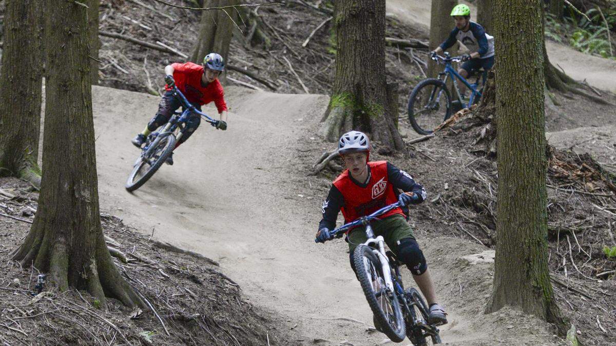Mountain bikers Miles Freelan, 15, left to right, Spencer Arps, 14, and Eric Brown of the Whatcom Mountain Bike Coalition ride the Evolution Trail on Galbraith Mountain in September 2016 in Bellingham. The Whatcom Mountain Bike Coalition announced in a Facebook post Sunday that trails on Galbraith Mountain will be closed Tuesday, Aug. 21, for herbicide spraying.