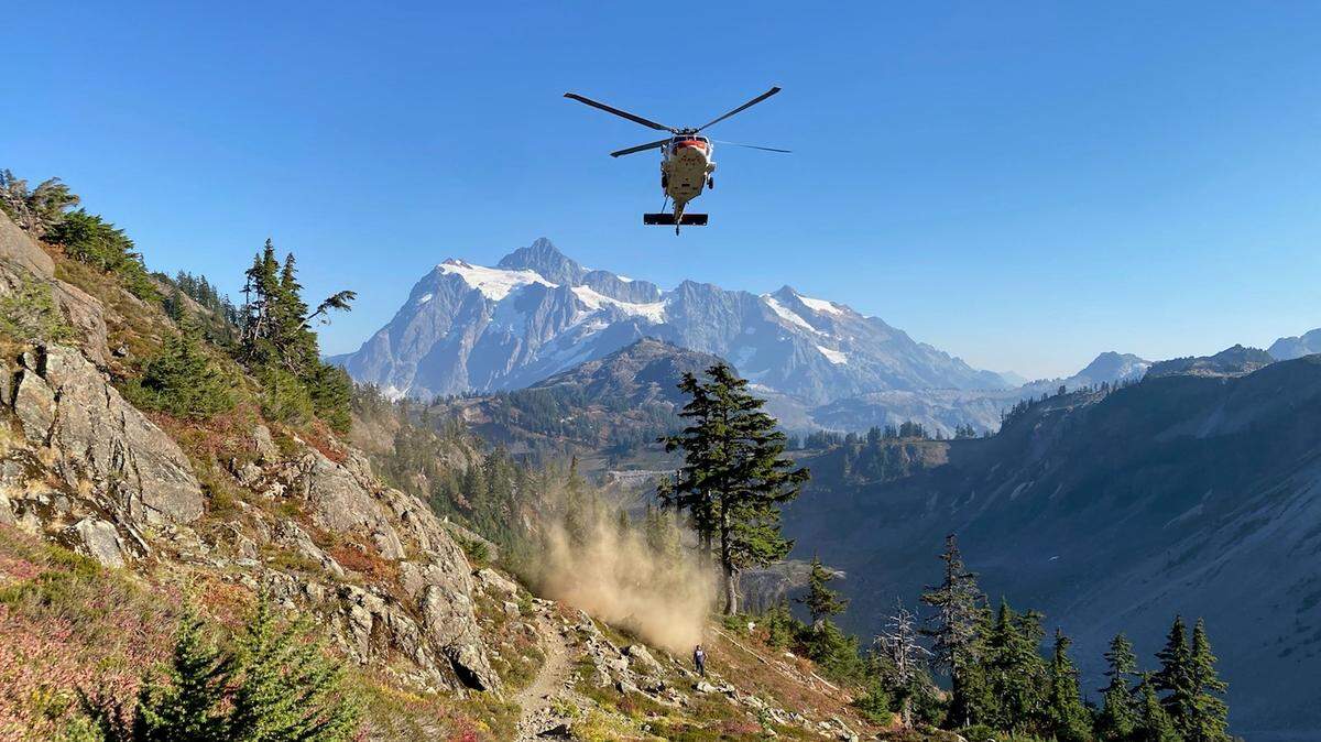 A Search and Rescue team from Naval Air Station Whidbey Island rescued a 55-year-old female hiker with a heat-related issue Saturday, Oct. 15, on the Chain Lakes Trail northeast of Mount Baker in Whatcom County.