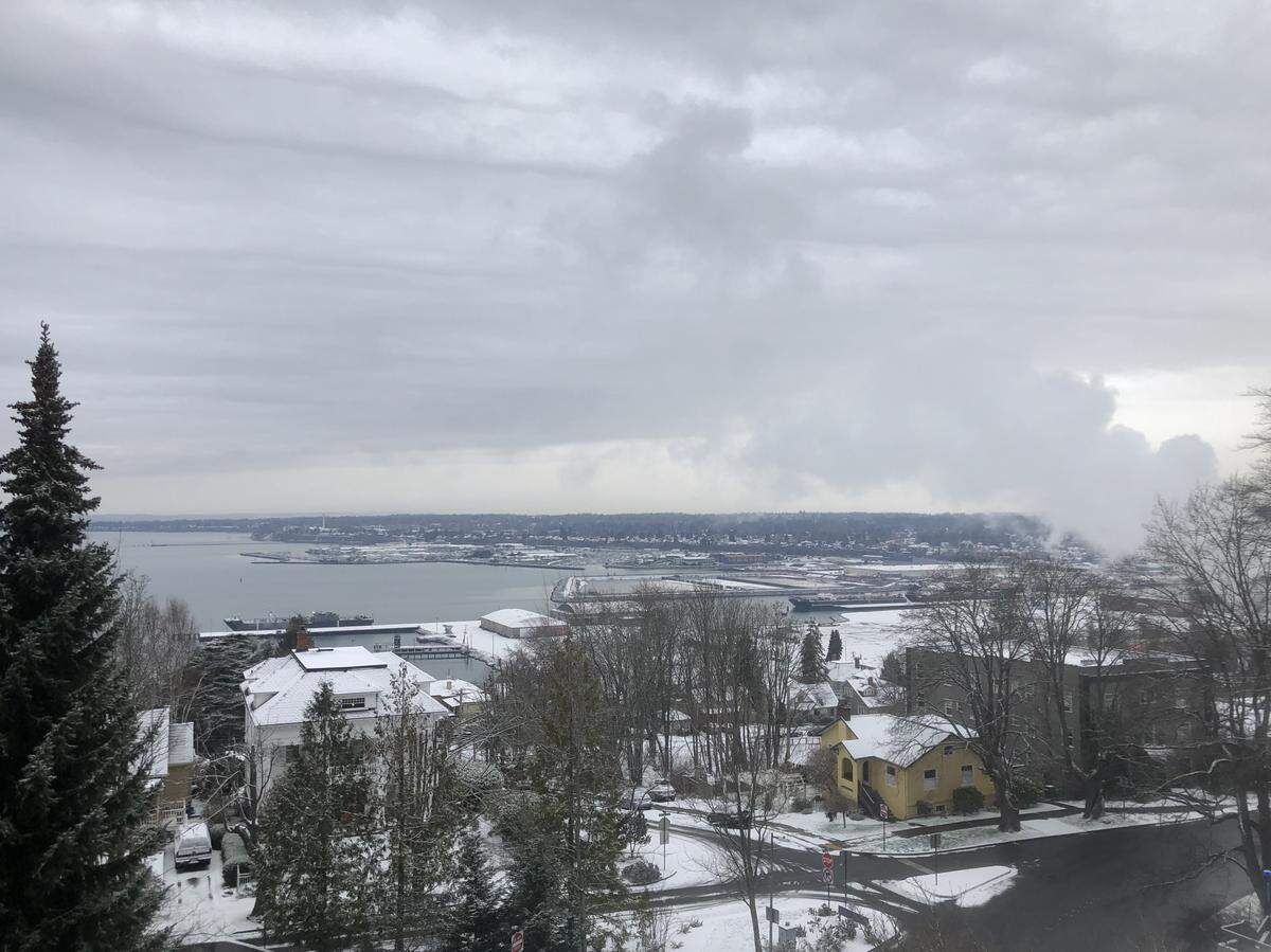 Light snow dusts Bellingham Friday, but streets were mostly clear downtown while some rural roads remained covered in compact snow and ice after the season’s first snowstorm last weekend.