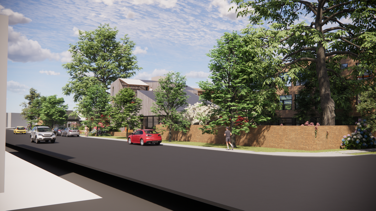 A rendering shows a street view of the proposed design for 4th Corner Commons.