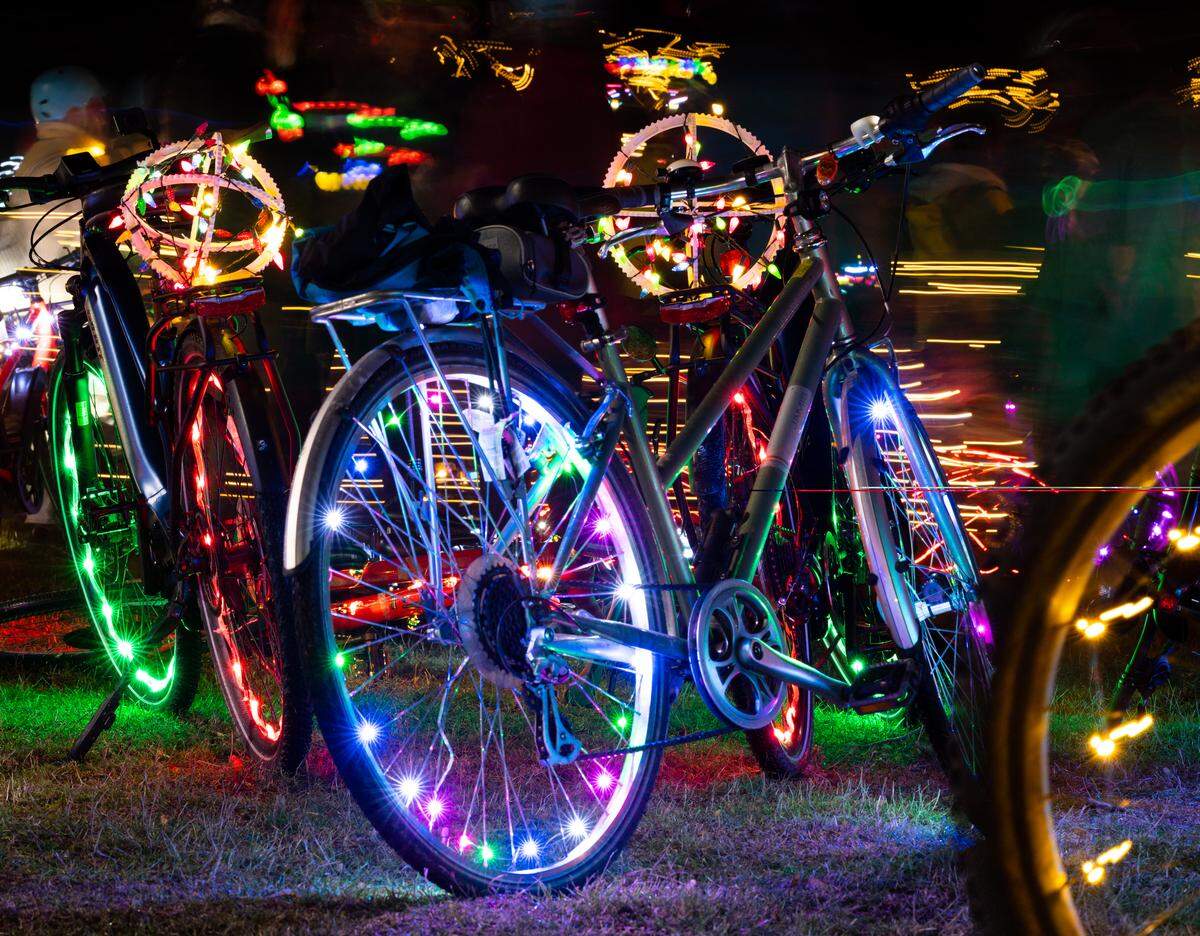 People decorate their bikes and sometimes themselves when they participate in the lighted Bellingham bike parade in December.