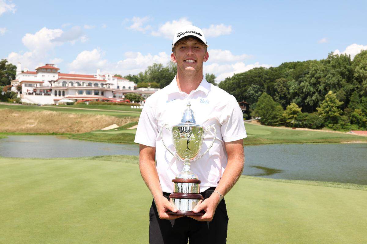 Junior PGA Championships winner Baylor Larrabee poses with his trophy at Congressional Country Club on Friday, Aug. 2, 2024 in Bethesda, Maryland.