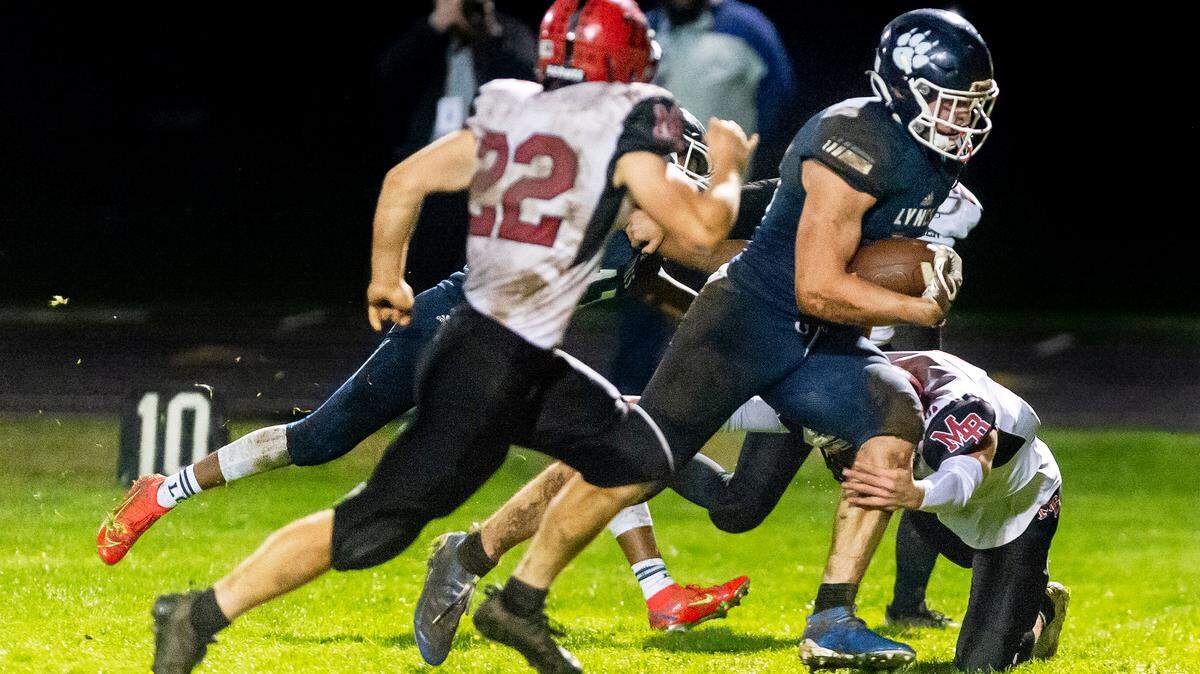 Lynden Christian tight end Kade Eldridge (44) runs 21 yards for a touchdown during the third quarter in the Lyncs Division 1A conference game Oct. 22. Lynden Christian went on to defeat Mount Baker 12 to 0. The No. 3 team now plays No. 6 Tenino at noon, Saturday, Nov. 20, at Civic Stadium in Bellingham.