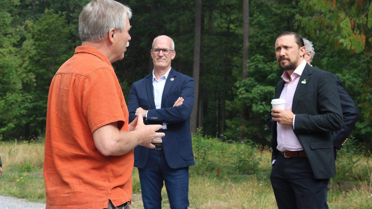 Carl Weimer, former director of the Pipeline Safety Trust, left, tells the story of the 1999 pipeline explosion to U.S. Rep. Rick Larsen and Tristan Brown, acting administrator of the Pipeline and Hazardous Materials Safety Administration. Weimer gave an informational tour to Brown and his team on Aug. 19, 2021.