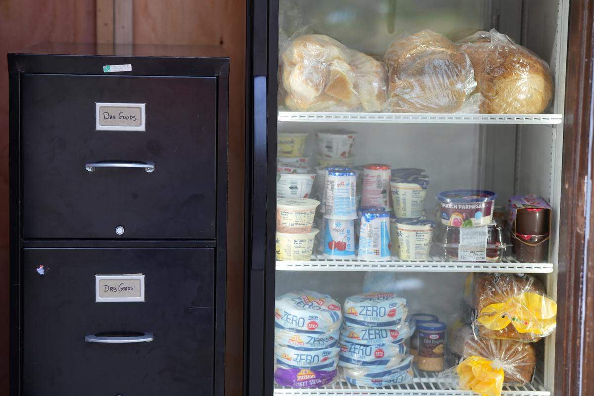 The fridge has free food for community members donated by local businesses and farms. A pantry also offers free, shelf-stable goods.