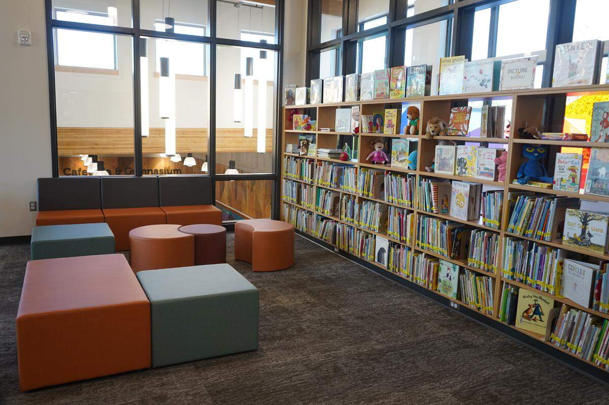 Books line the shelves of the library at Sunnyland Elementary School at a public open house for the new school Thursday, Sept. 22, in Bellingham.