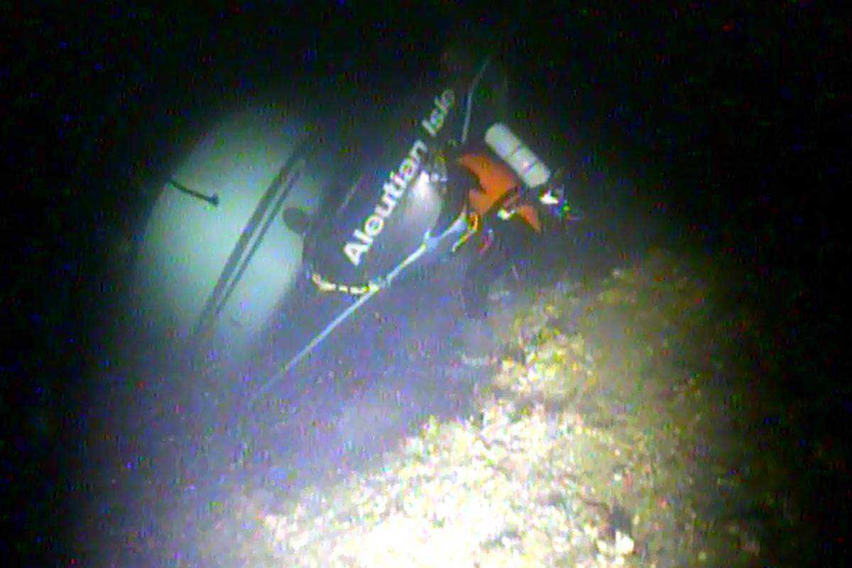 A diver inspects the Aleutian Isle on Aug, 31, 2022. The 58-foot fishing boat sank in 200 feet of water off the west side of San Juan Island, spilling more than 1,300 gallons of diesel fuel.
