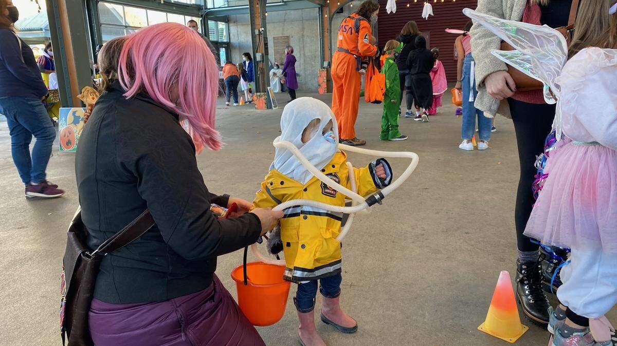 Irene Greear, 3, was a ghost firefighter Friday afternoon, Oct. 29, at Depot Market Square in Bellingham. The Bellingham Parks and Recreation Department’s candy-free Halloween event offered game booths for kids preschool through 2nd grade.