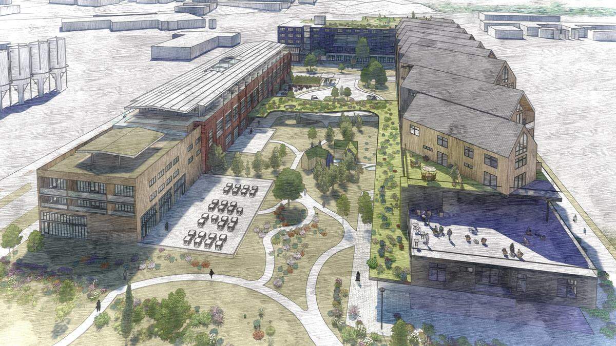 A rendering shows a proposed boutique hotel, community space and residential buildings in the proposed BoardMill Block along W Laurel Street in Bellingham, Wash.