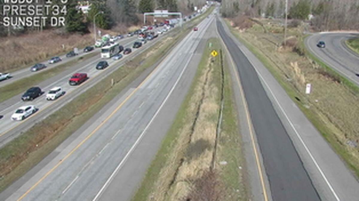 Traffic backs up Thursday, March 28, 2019, on southbound Interstate 5 just south of Sunset Drive in Bellingham after a collision blocking the right lane.