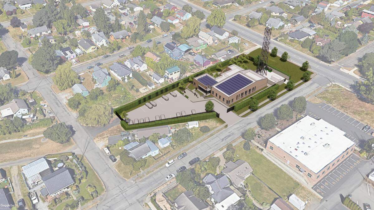 An artist’s rendering shows the new Bellingham 911 dispatch center at the corner of Alabama and Iron streets. The current dispatch center is located where the lawn is along Alabama Street in this image.