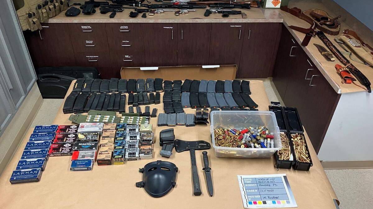 Police confiscated 11 firearms along along with ammunition, knives, a hatchet and body armor following a nearly six-hour standoff with a man at a motel Tuesday, Oct. 4, in Ferndale.