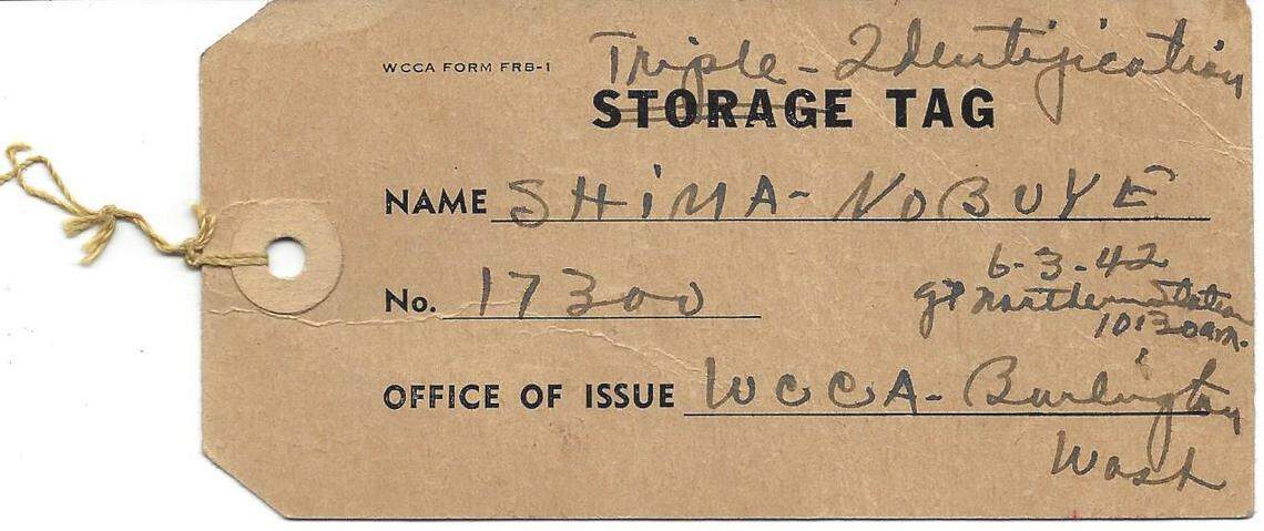 Pat Kawabata said this tag was pinned on her for identification when she and her family were forced out of their Bellingham home and  into internment camps. Then known as Nobuye "Pat" Shima, she was a girl of 6 when she and thousands of Japanese-Americans on the West Coast were rounded up following the bombing of Pearl Harbor.