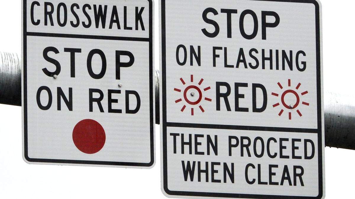 HAWK crosswalk signals, installed on Alabama Street in Bellingham in 2015, flash solid red, meaning drivers are to stop and remain stopped, and flashing red, which is to be treated like a stop sign — come to a complete stop and proceed when clear.