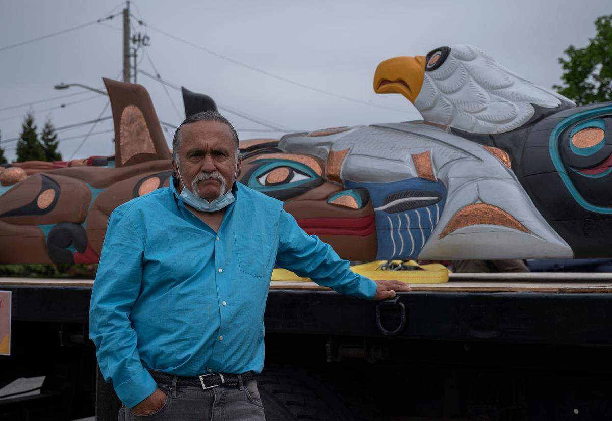 Jewell James, Wednesday, May 5, in Ferndale, was assisted by volunteers of all ages in carving and painting the totem pole that will travel from Whatcom County to Washington D.C. on a 16,000-mile journey that takes it to dozens of sacred sites across the U.S.