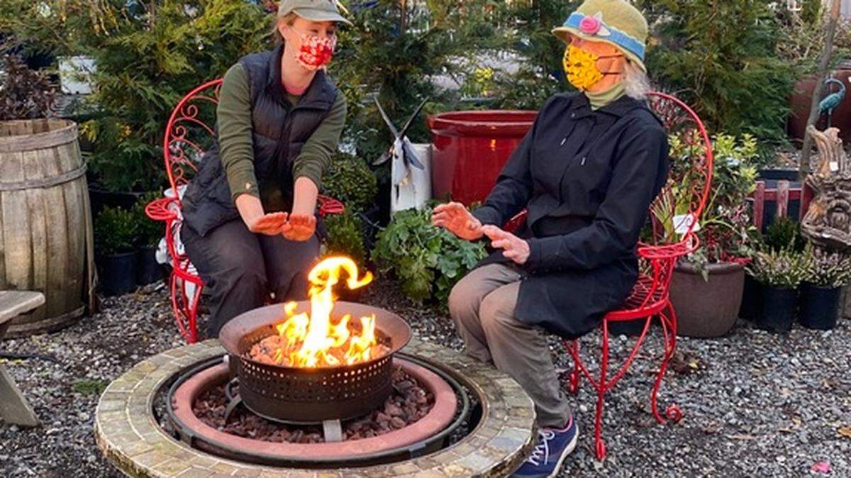 Paige Lanham and Marcy Plattner hang out at Garden Spot Nursery near Trader Joe’s in this undated photo. Plattner announced that she is retiring at the end of December and is turning the business over to Lanham, a longtime employee.