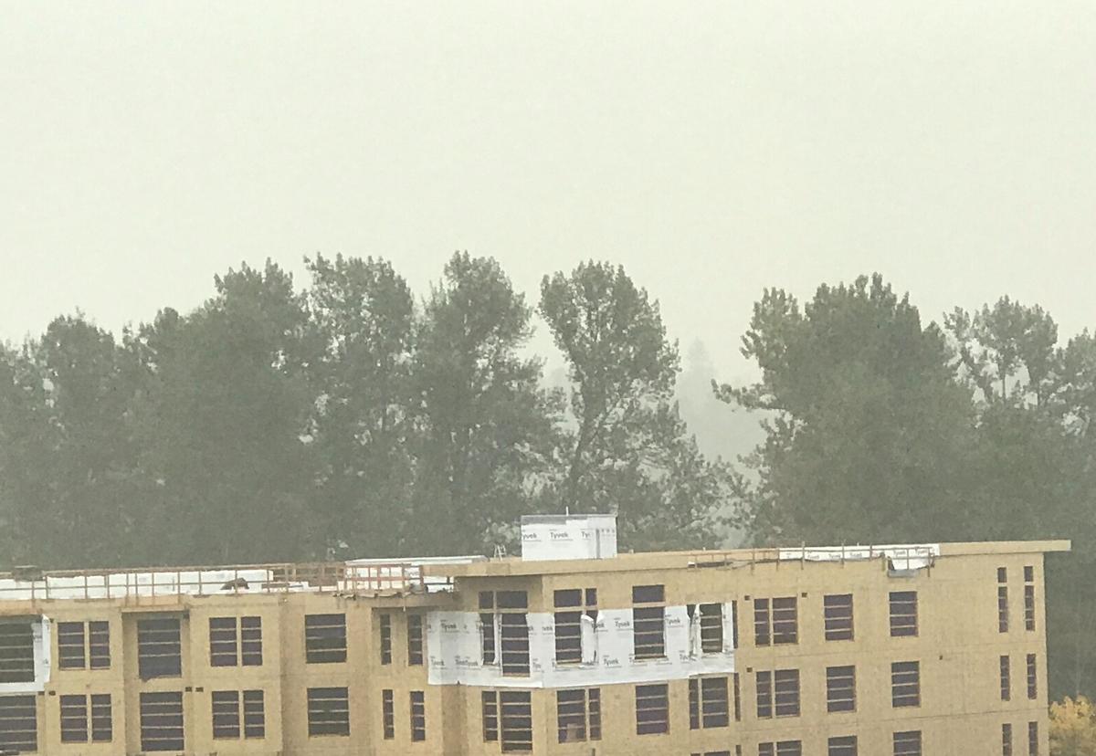 A smoky, foggy haze continues to hover above the Barkley neighborhood Tuesday. Smoke from wildfires remains an issue in Bellingham and Whatcom County, despite overnight rain, and Whatcom Unified Command canceled drive-thru testing.