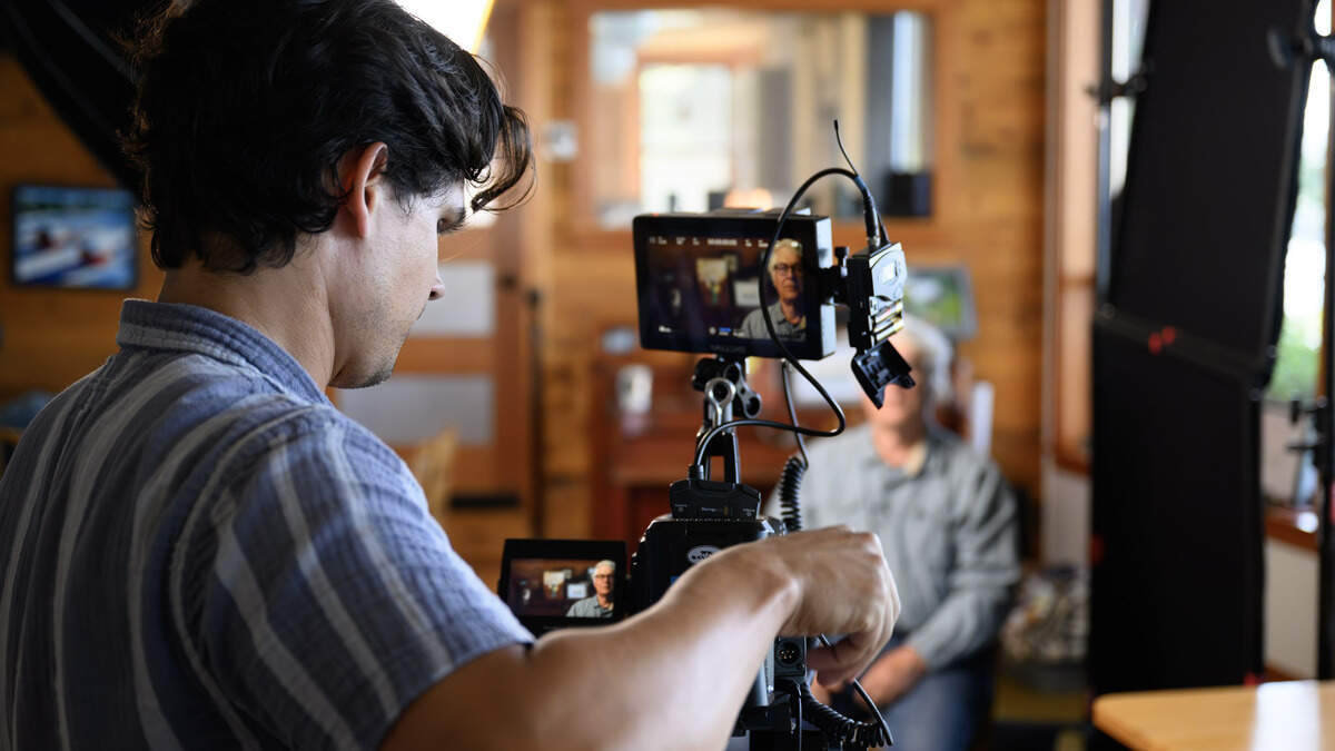Samuel Wolfe frames up a shot at Salish Center for Sustainable Fishing Methods on Lummi Island in Washington during an interview for “The Last Reefnetters.”