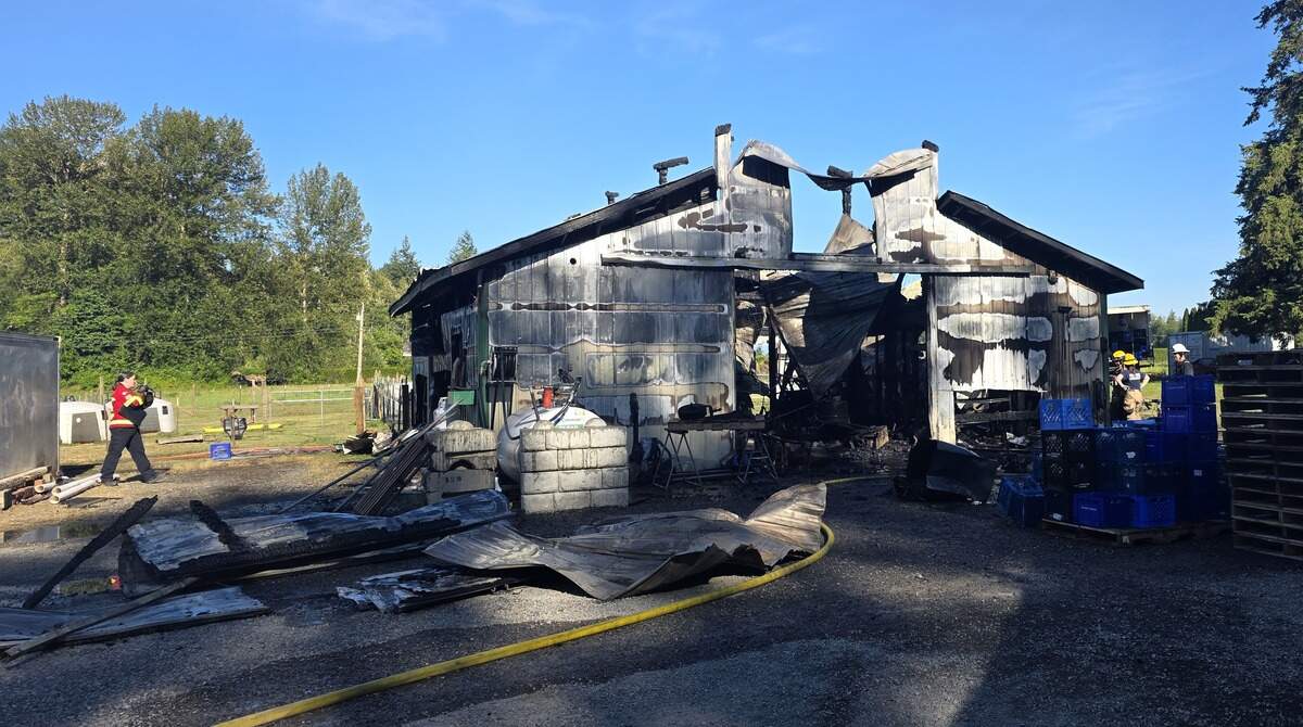The aftermath of a fire that destroyed a workshop/barn at Grace Harbor Farms in Whatcom County.