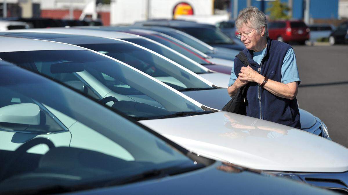 A customer looks at new Toyota Camrys while hers is in the shop at then-Wilson Motors at 1100 Iowa St. in 2012. Now known as Bellingham Toyota and Mercedes, the dealerships were purchased by a Canadian company on Tuesday, Jan. 31.