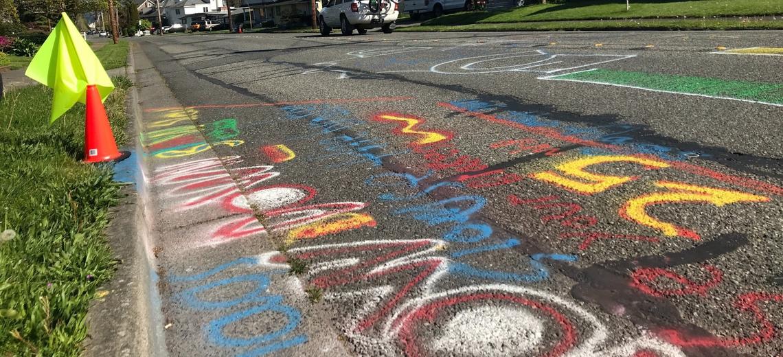 A DIY crosswalk with chalk markings made by neighbors aims to slow traffic on Eldridge Avenue in Bellingham on May 8.