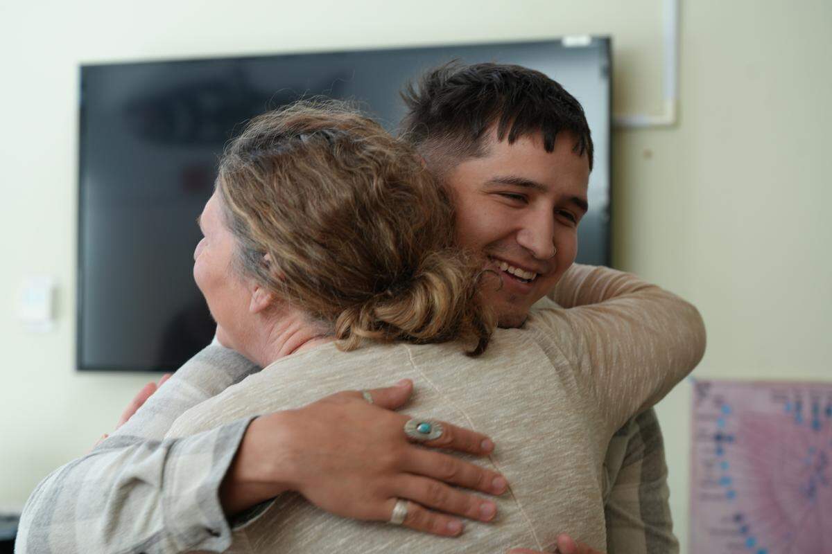 Free Borsey, one of the brothers who was awarded the 2024 Bullitt Prize by Washington Conservation Action, is congratulated by Northwest Indian College Native Environmental Science Department Chair Emma Norman.
