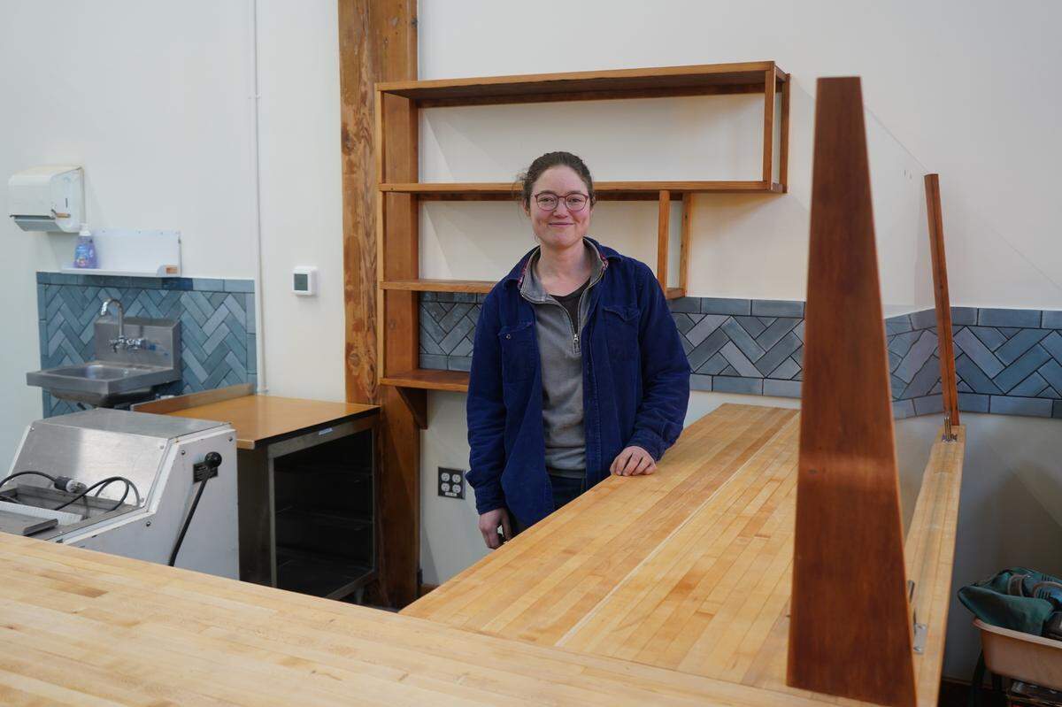 Raven Bakery owner and baker Sophie Williams stands in her new storefront location at 205 Prospect St. on Tuesday, March 7, in Bellingham.