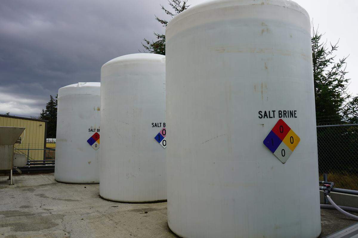 Three vats of salt brine mixture sit full and ready to be used for de-icing Thursday, Nov. 3, in Bellingham. The brine is sprayed on city roads ahead of cold weather events to prevent ice from forming.