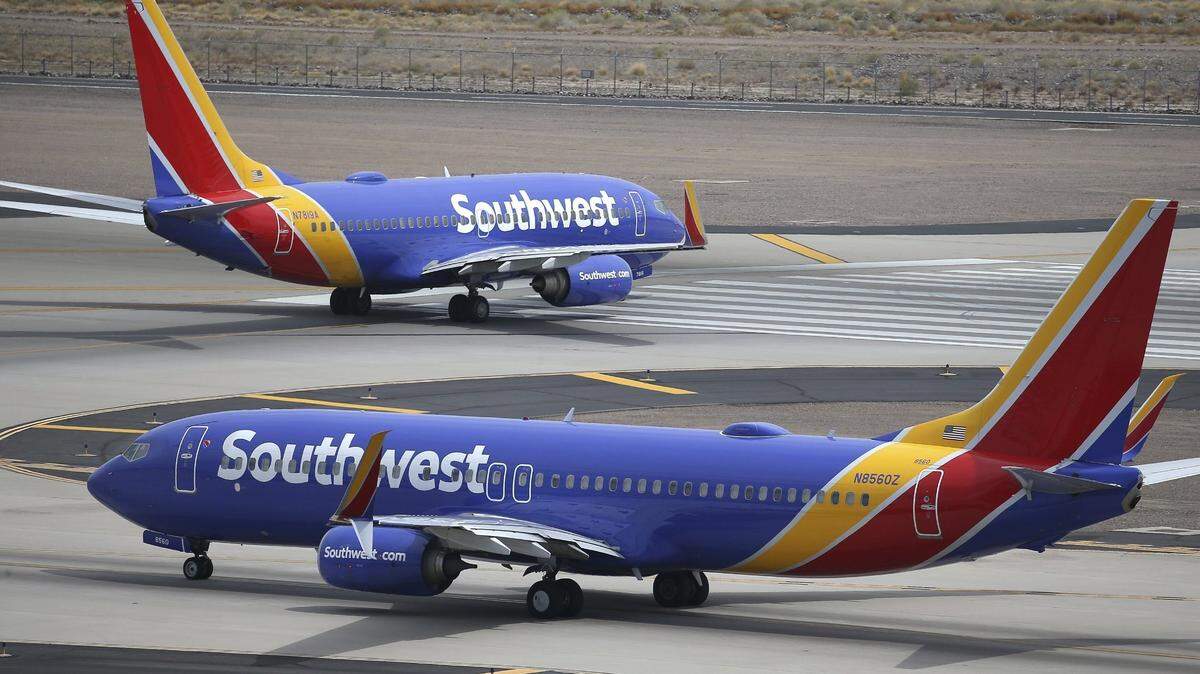 FILE - This July 17, 2019 photo shows Southwest Airlines planes at Phoenix Sky Harbor International Airport in Phoenix. Southwest Airlines Co. reports financial earns on Thursday, Oct. 24.