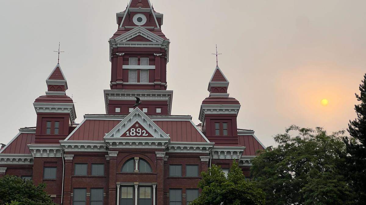Smoke from wildfires in British Columbia and in eastern Whatcom County mixes with low clouds from the marine layer over the Old City Hall on Thursday, Sept. 4 in Bellingham.