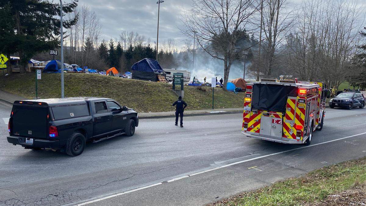 A firetruck stops on Fraser Street in Bellingham on Thursday, Feb. 11, after an explosion was reported from the homeless camp on the parking lot near Frank Geri Softball Fields near the Civic Athletic Complex.