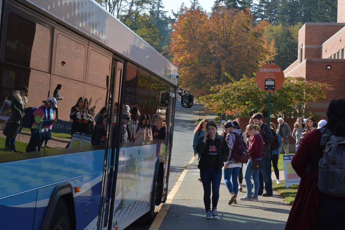 Riders board a bus at Viking Union on the Western Washington University campus on Thursday , Oct. 18, 2018.