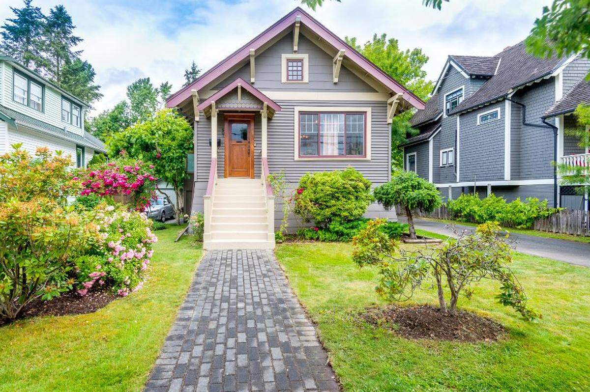 An “up-cycled” house in New Westminster, B.C., was listed by Nickel Bros. Inc. The company later barged the house to Bellingham and early Thursday morning moved it to its new location in the Happy Valley Neighborhood.