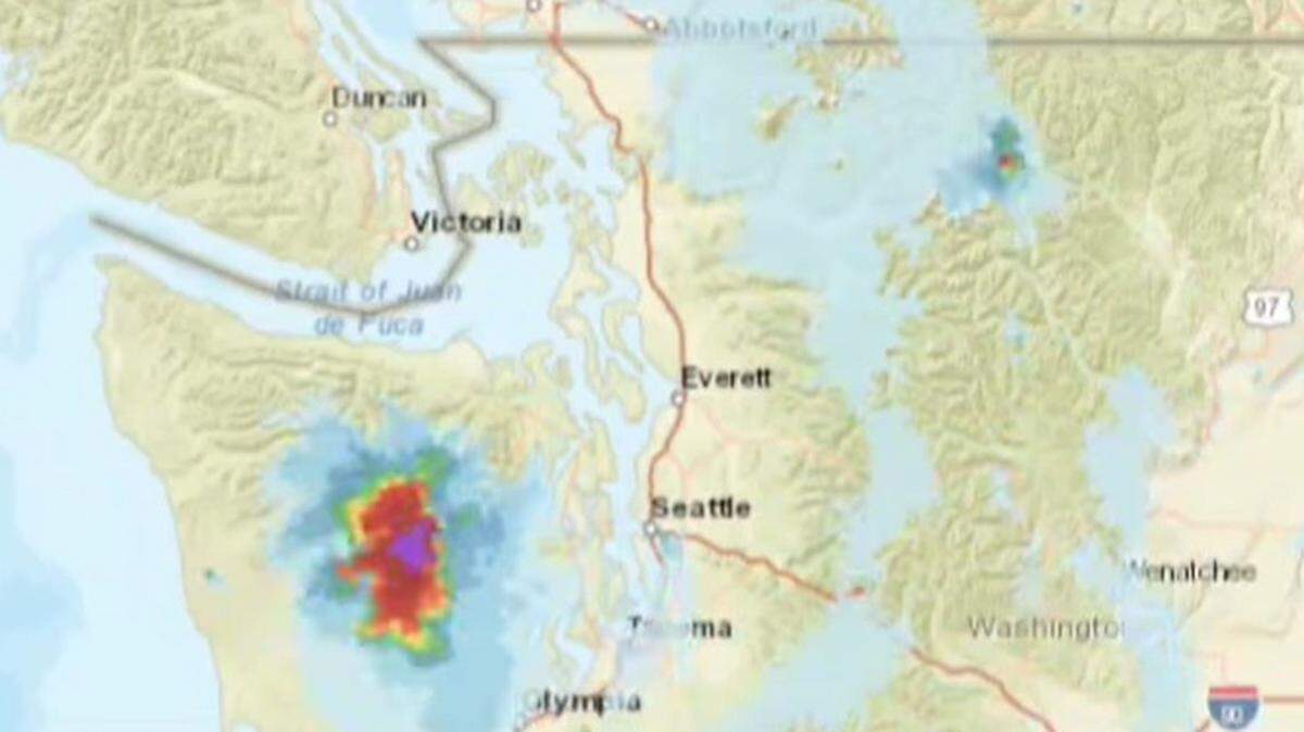 A National Oceanic and Atmospheric Administration map shows high-level smoke (in blue) from wildfires over Northwest Washington on Wednesday, July 30, 2025.