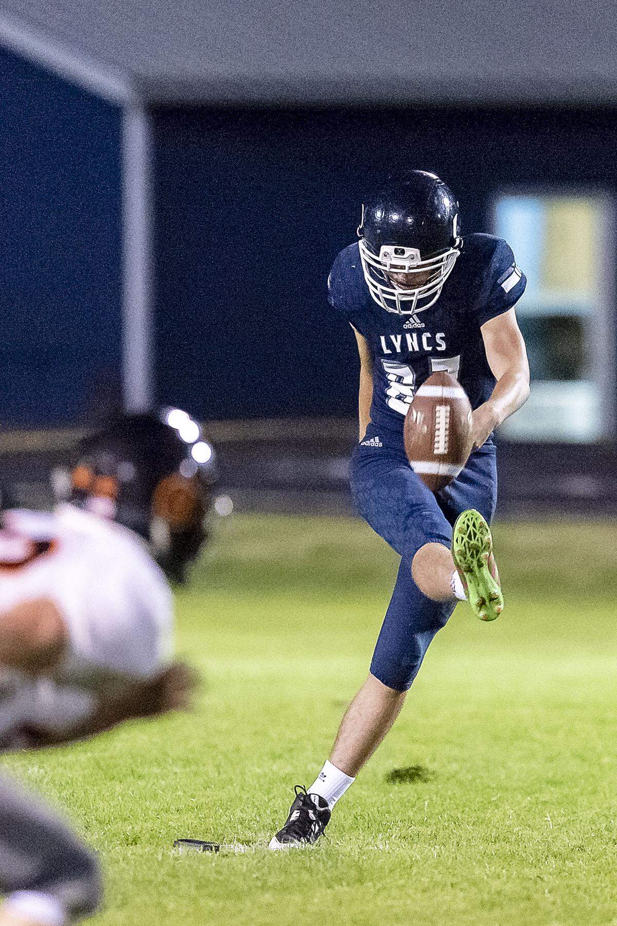 Lynden Christian kicker Eli DenBleyker kicks off against Blaine Sept. 20. DenBleyker, along with Bryce Bouwman and Zach Sipma, has made unexpected contributions to the Lynden Christian football team’s run to the Class 1A state championship game. The Lyncs face Royal Saturday in Lakewood.