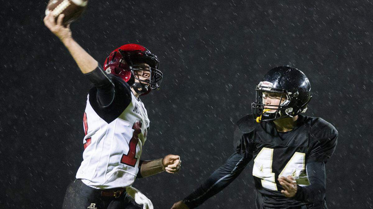 Meridian’s Bryson Hickok, right, puts pressure on Mount Baker’s Kaleb Bass in 2017. Bass was known as a ‘game manager’ when he started as a sophomore, but has developed into a strong senior leader who hopes to lead the Mountaineers back to the 1A state playoffs.