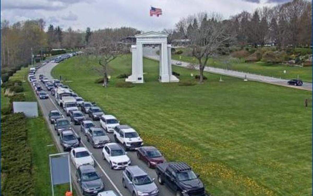 Southbound traffic is backed up Friday, April 15, on Highway 99 at the Peace Arch border crossing to enter Whatcom County.