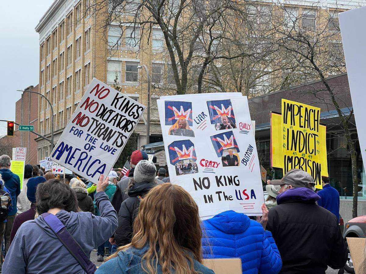 Protesters take to the street for a march during a No Kings event in Bellingham on Saturday.