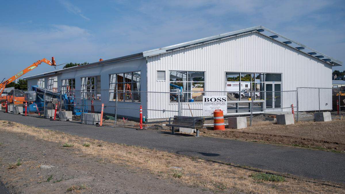 The Fisherman’s Pavilion building during construction at Zuanich Park on Wednesday, Aug. 25, 2021, in Bellingham, Wash. The 9,000-square-foot unheated building will serve as a workspace for commercial fishermen and be available for events.
