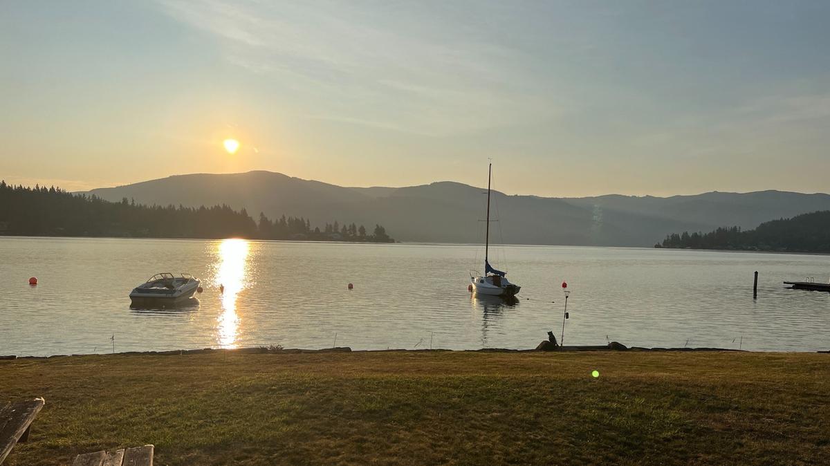 A smoky haze lines the horizon at sunrise along Lake Whatcom Boulevard near Coronado Avenue on Wednesday.