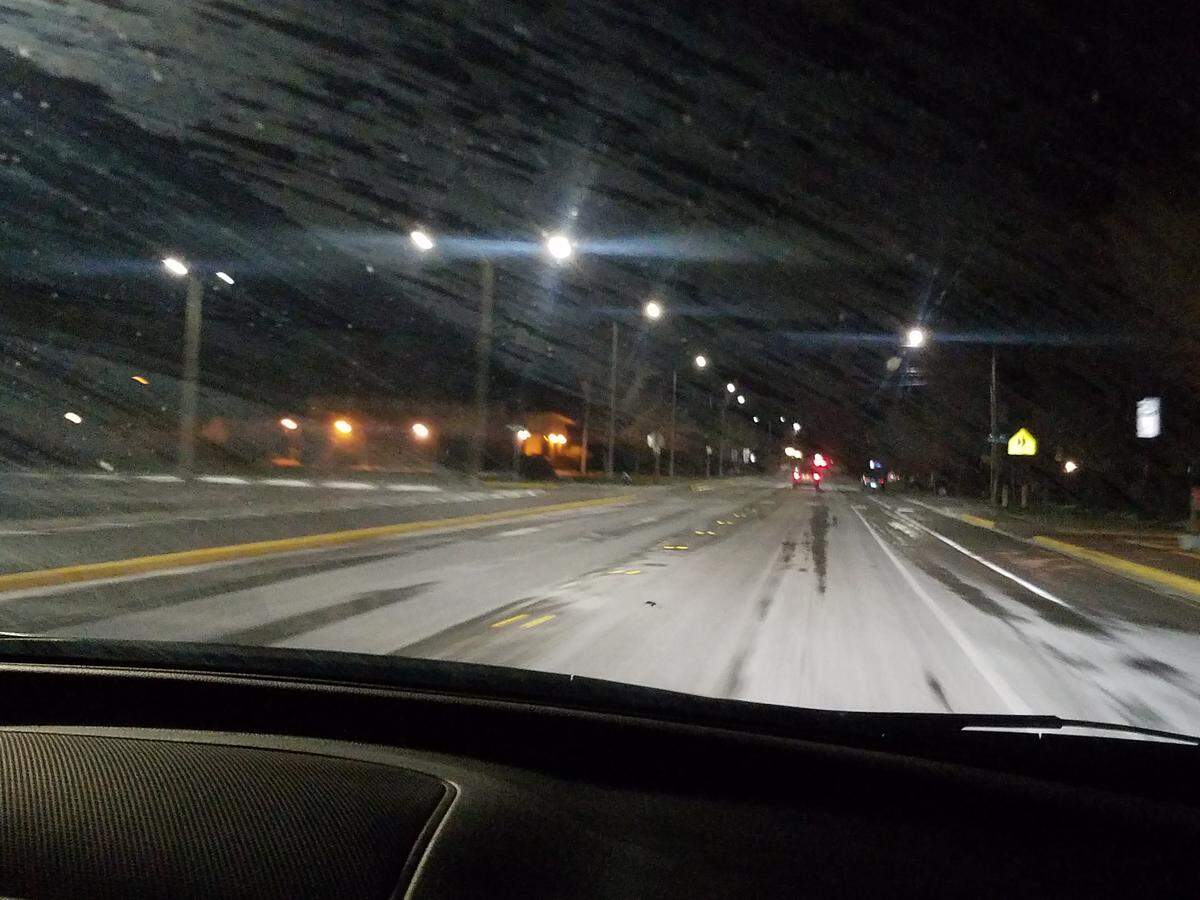 Roads were mostly clear in driving lanes, but icy at intersections near the schools in Blaine at 5 a.m. Tuesday.