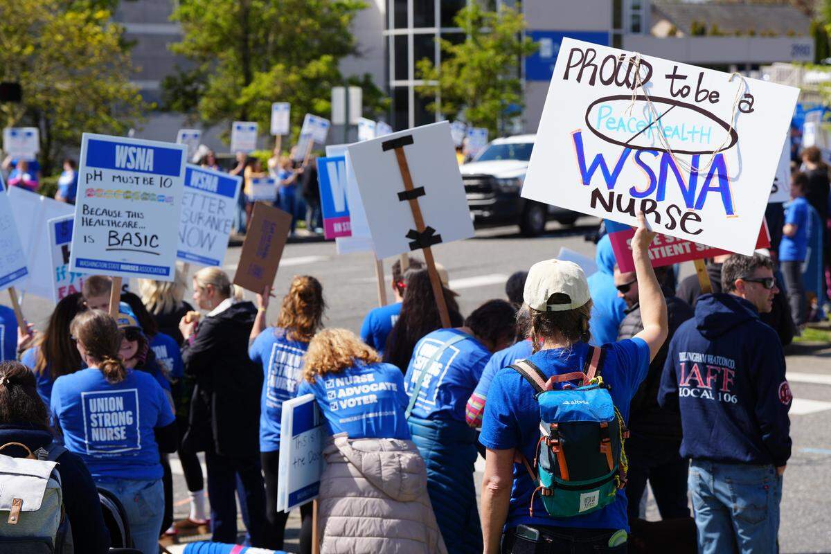 PeaceHealth nurses held an informational picket outside of St. Joseph Medical Center amid stalled contract negotiations on April 29 in Bellingham. The nurses were calling for more competitive wages and better health care.