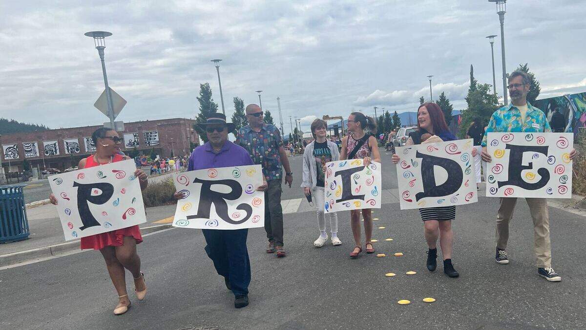 Members of the Bellingham City Council march in the Bellingham Pride Parade near Waypoint Park in Bellingham in 2022. Holding the signs, from left, are: Kristina Michele Martens, Skip Williams, Hannah Stone, Hollie Huthman and Michael Lilliquist.