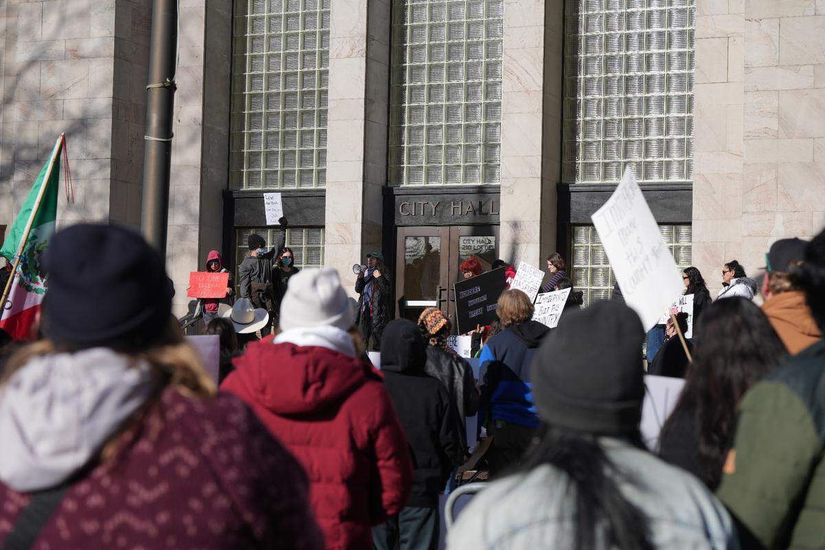 More than 100 people gathered at City Hall to protest ICE and undocumented immigrant deportations on Feb. 9 in Bellingham.