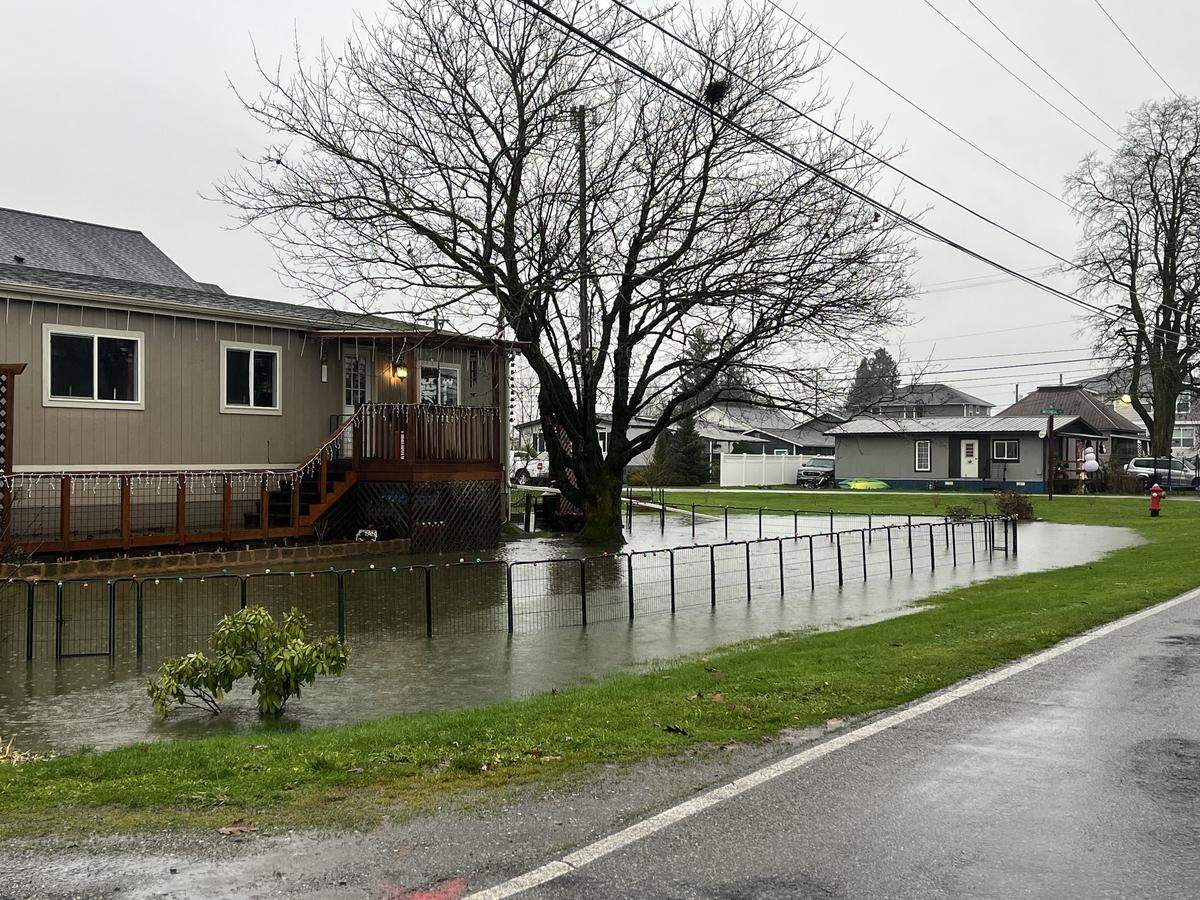 Water surrounded a home Dec. 10, 2025, in Sumas.