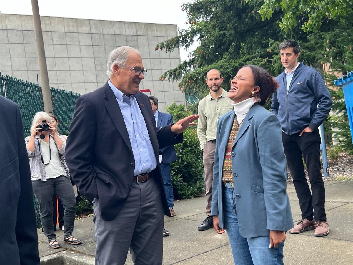 Washington Gov. Jay Onslee chats with third-year Western Washington University student Dibora Markos at the start of a tour to check on Climate Commitment Act progress. Inslee and WWU officials went to the Steam Plant and the new Kaiser-Borsari Building on Wednesday, Sept. 11, 2024.