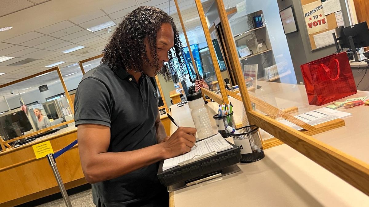 Joel Johnson files his petitions to run for Bellingham Mayor on Friday afternoon, May 19, at the Whatcom County Courthouse in Bellingham. Elections staff must count and verify the signatures before Johnson becomes an official candidate.