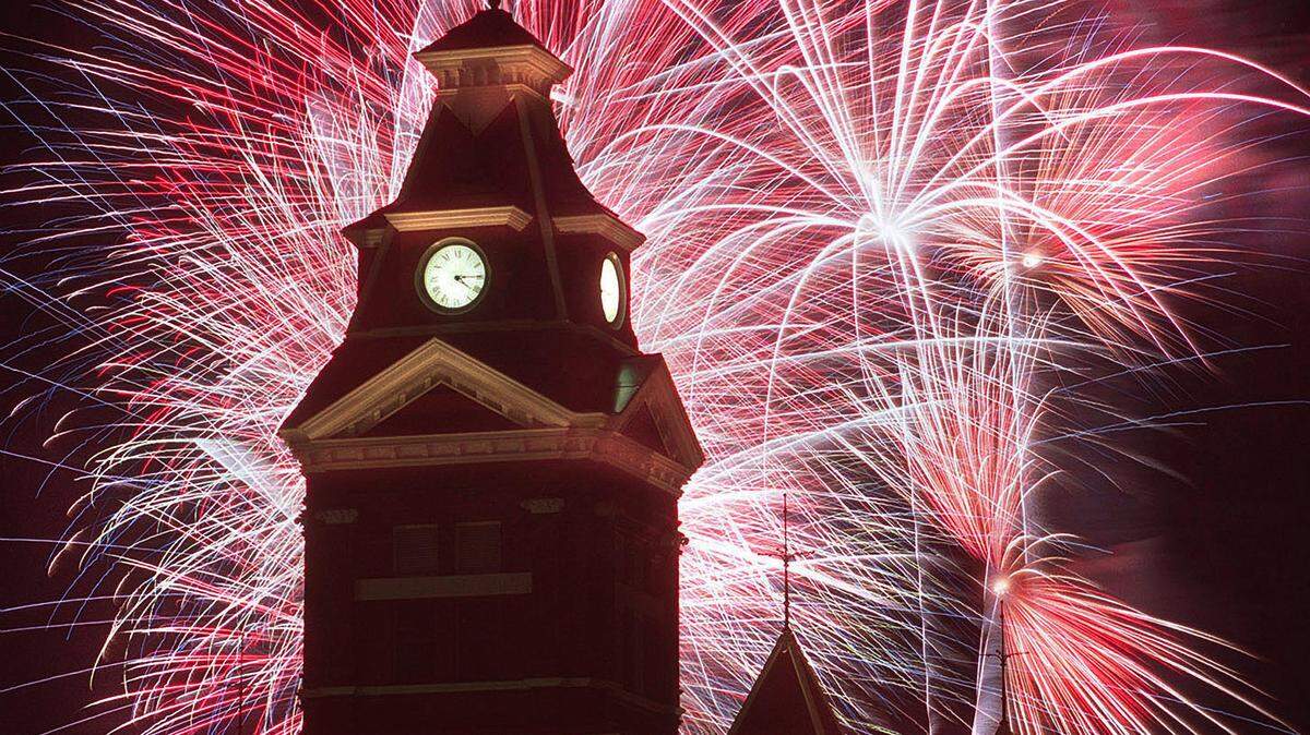 The Whatcom Museum is silhouetted by Fourth of July fireworks that explode behind the historic Bellingham landmark in 1999.