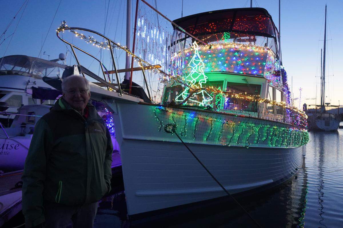 Dan Ringler said he spent more than 100 hours decorating his boat, Seahome, with about 7,000 LED lights for Bellingham Yacht Club’s annual lighted boat parade on Saturday, Dec. 3, 2022, in Bellingham, Wash.